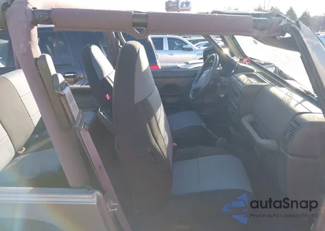 2000 Jeep Wrangler Sport z USA, uszkodzony, nr VIN 1J4FA49S2YP738494